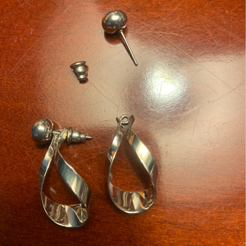 Sterling Silver Earring Jackets and costume blue stud earrings.